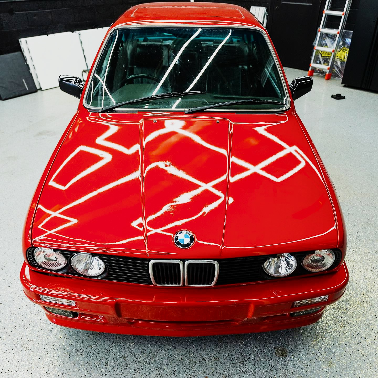 Gloss red BMW E30 after paint correction